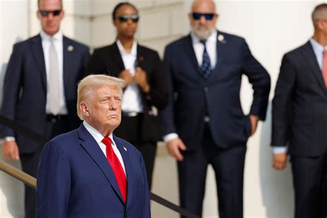 Trump posts campaign video of Arlington National Cemetery visit .